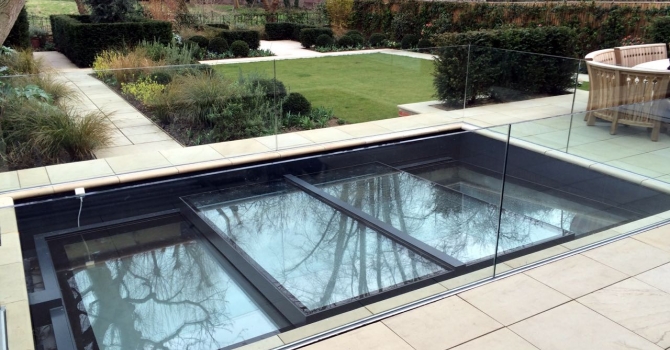 Slide opening rooflight with balustrade